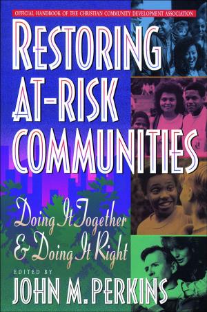Cover of the book Restoring At-Risk Communities by Thomas J. Davis