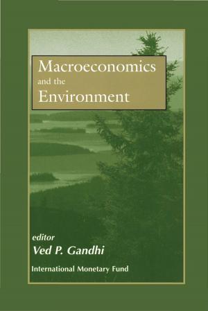 Cover of the book Macroeconomics and the Environment by International Monetary Fund.  Monetary and Capital Markets Department