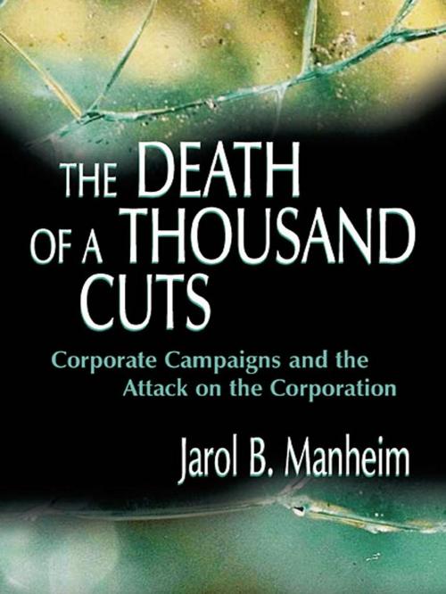 Cover of the book The Death of A Thousand Cuts by Jarol B. Manheim, Taylor and Francis