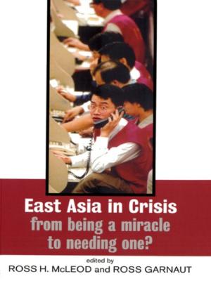 Cover of the book East Asia in Crisis by Ravi Srinivasan, Kiel Moe