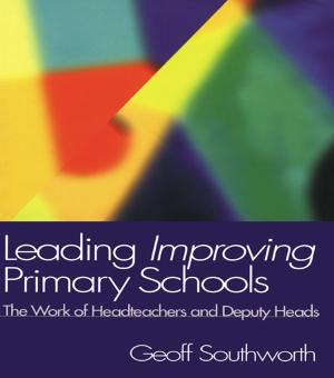 Cover of the book Leading Improving Primary Schools by 
