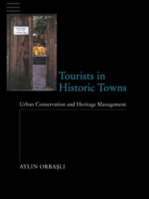 Cover of the book Tourists in Historic Towns by Roger Morriss