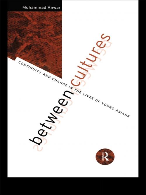 Cover of the book Between Cultures by Muhammad Anwar, Taylor and Francis