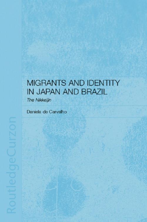Cover of the book Migrants and Identity in Japan and Brazil by Daniela de Carvalho, Taylor and Francis