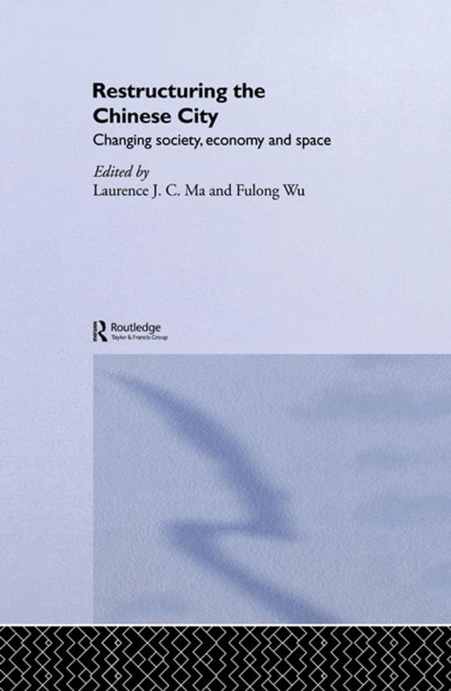 Cover of the book Restructuring the Chinese City by Laurence J.C. Ma, Fulong Wu, Taylor and Francis