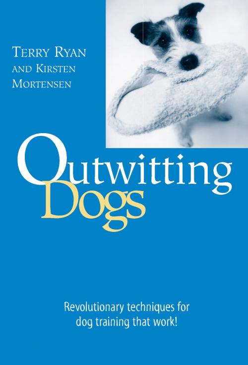 Cover of the book Outwitting Dogs by Terry Ryan, Kirsten Mortensen, Lyons Press