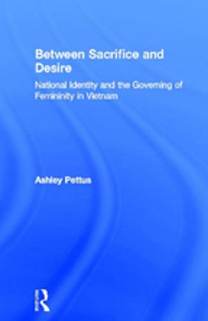 Cover of the book Between Sacrifice and Desire by Andrew Benjamin