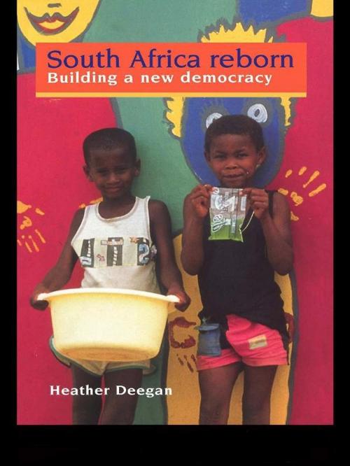 Cover of the book South Africa Reborn: Building A New Democracy by Dr Heather Deegan, Heather Deegan, Taylor and Francis