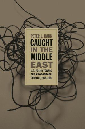 Cover of the book Caught in the Middle East by J. Brent Morris