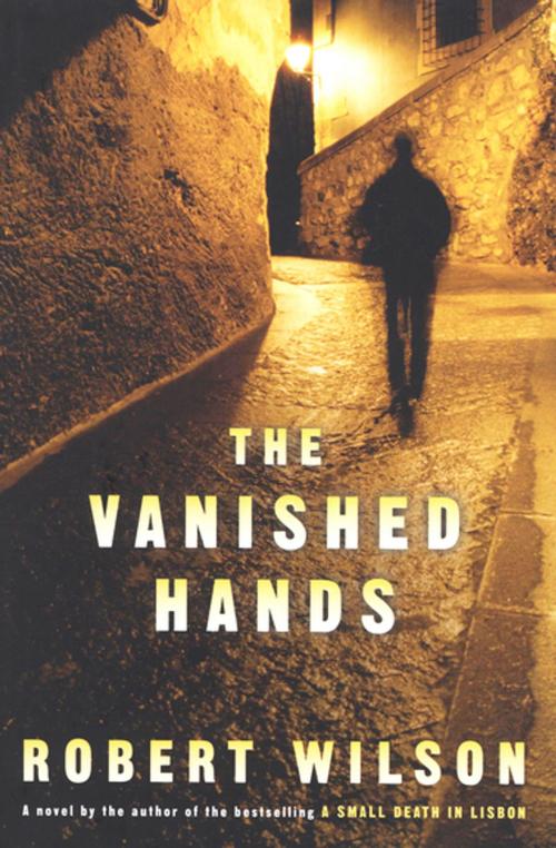 Cover of the book The Vanished Hands by Robert Wilson, Houghton Mifflin Harcourt