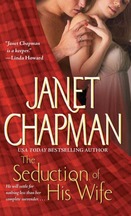 Cover of the book The Seduction of His Wife by Janet Chapman, Pocket Books