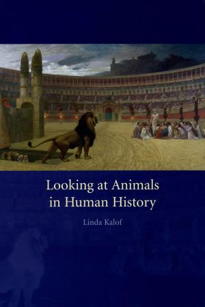 Cover of the book Looking at Animals in Human History by Paul Thomas