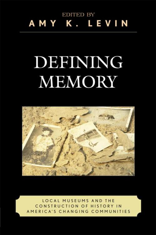 Cover of the book Defining Memory by Tami Christopher, James Connor, J Daniel d'Oney, Jessie Embry, Eric Gable, Lucian Gomoll, Richard Handler, Donna Langford, Amy Levin, Mauri L. Nelson, Stuart Patterson, Heather Perry, Jay Price, Michael Rhode, Eric Sandweiss, Elizabeth Vallance, Rowman & Littlefield Publishers