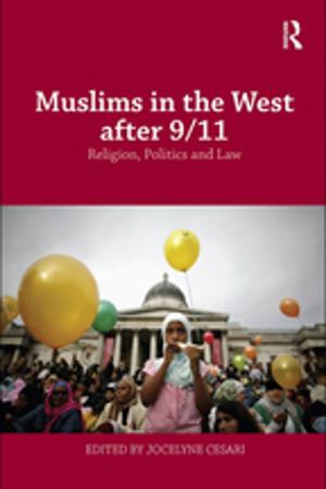 Cover of the book Muslims in the West after 9/11 by Russell J. Reising