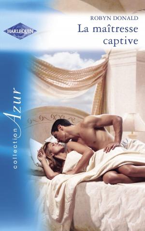 Cover of the book La maîtresse captive (Harlequin Azur) by Leslie Kelly