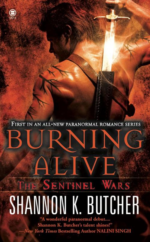 Cover of the book Burning Alive by Shannon K. Butcher, Penguin Publishing Group