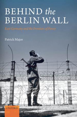Cover of the book Behind the Berlin Wall by Panos Koutrakos