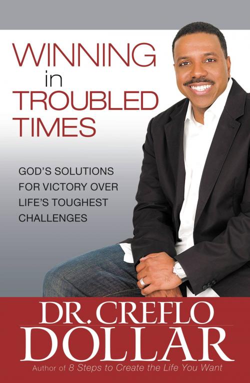 Cover of the book Winning in Troubled Times by Creflo Dollar, FaithWords