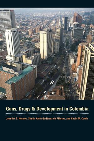Cover of the book Guns, Drugs, and Development in Colombia by Luis E. Carranza, Fernando Luiz Lara