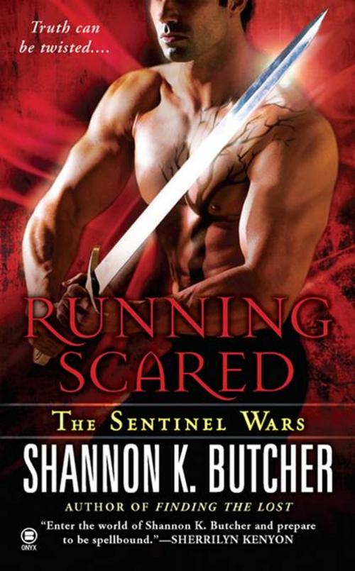 Cover of the book Running Scared by Shannon K. Butcher, Penguin Publishing Group