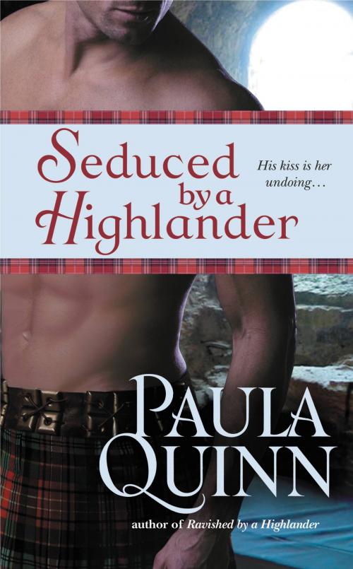 Cover of the book Seduced by a Highlander by Paula Quinn, Grand Central Publishing