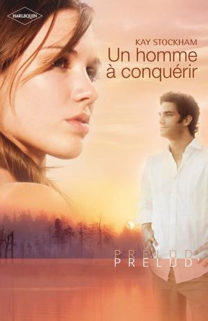 Cover of the book Un homme à conquérir by Stella Bagwell
