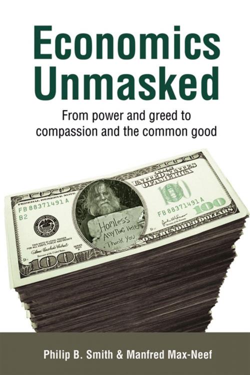 Cover of the book Economics Unmasked by Philip B. Smith, Manfred Max-Neef, UIT Cambridge Ltd.