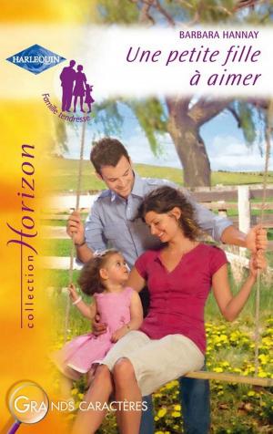 Cover of the book Une petite fille à aimer (Harlequin Horizon) by Carolyn R. Scheidies