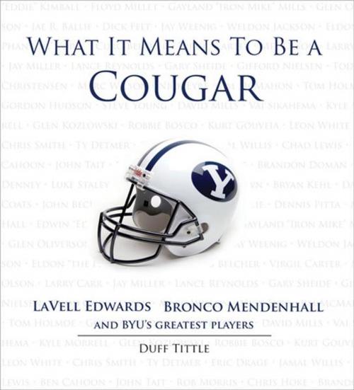 Cover of the book What It Means to Be a Cougar by Duff Tittle, LaVell Edwards, Bronco Mendenhall, Triumph Books