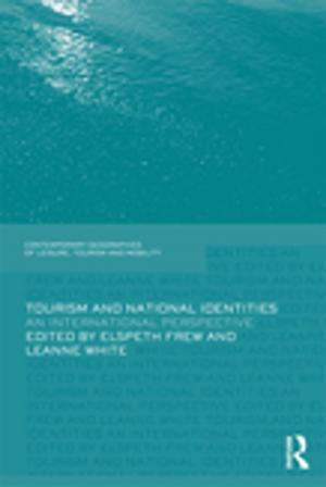 Cover of the book Tourism and National Identities by Cyrus Bina, Laurie M. Clements, Chuck Davis