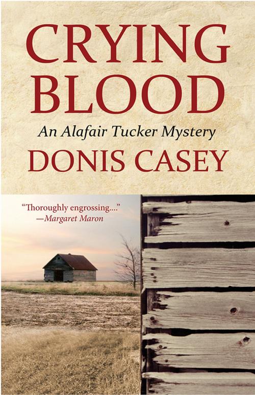 Cover of the book Crying Blood by Donis Casey, Sourcebooks