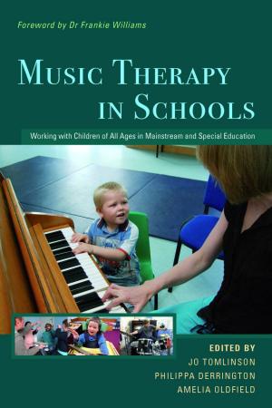 Cover of the book Music Therapy in Schools by Becky Heaver, Michael Barton, Andrew Smith, Colin Newton, Dominic Walsh, Maggie, Debbie Allen, Sarah Galley, Gerard Wilkie, Eloise, Maurice Frank, Serena Shaw, Andy R, Natasha Goldthorpe, Barnabear