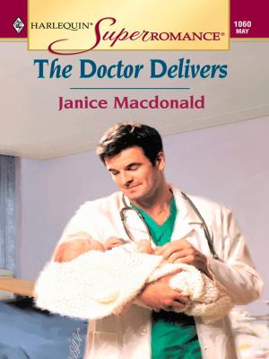 Cover of the book THE DOCTOR DELIVERS by Janice Maynard