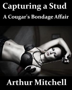 Cover of the book Capturing a Stud: A Cougar's Bondage Affair by Adeline Moore