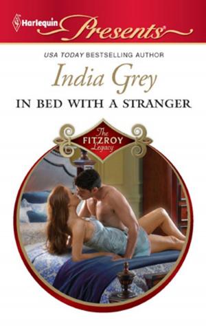 Cover of the book In Bed with a Stranger by Delores Fossen