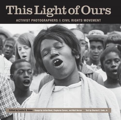 Cover of the book This Light of Ours by Julian Bond, Clayborne Carson, Matt Herron, Charles E. Cobb Jr., University Press of Mississippi/The Center for Documentary Arts