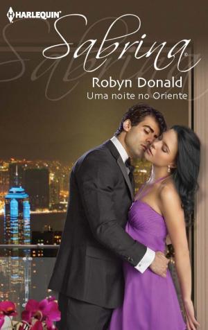 Cover of the book Uma noite no oriente by Robyn Donald