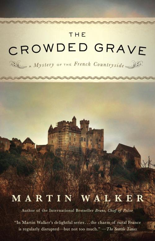 Cover of the book The Crowded Grave by Martin Walker, Knopf Doubleday Publishing Group