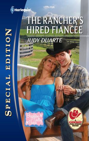 Book cover of The Rancher's Hired Fiancee