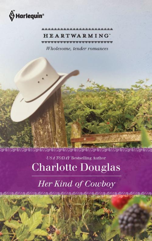 Cover of the book Her Kind of Cowboy by Charlotte Douglas, Harlequin