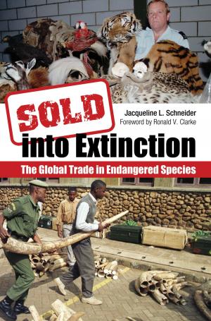 Cover of the book Sold into Extinction: The Global Trade in Endangered Species by Martin A. Parlett