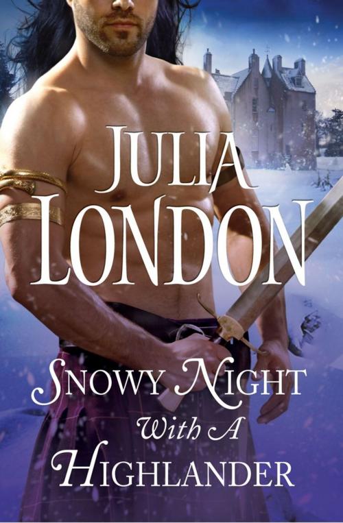 Cover of the book Snowy Night with a Highlander by Julia London, Pocket Star