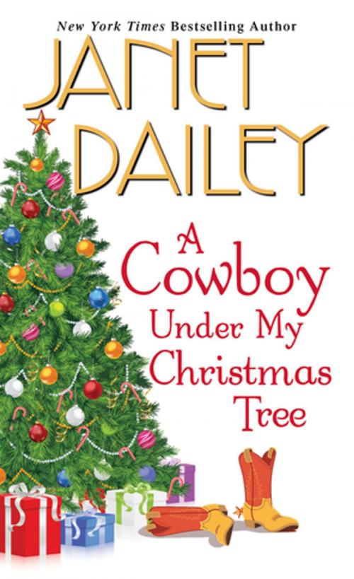 Cover of the book A Cowboy Under My Christmas Tree by Janet Dailey, Zebra Books