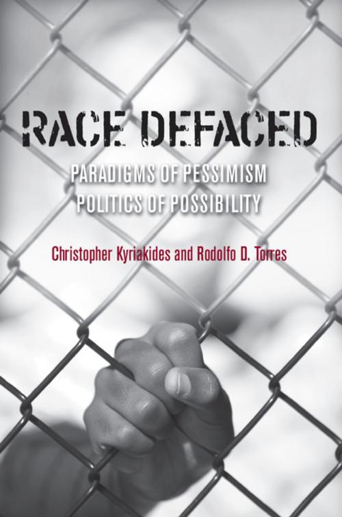 Cover of the book Race Defaced by Rodolfo Torres, Christopher Kyriakides, Stanford University Press