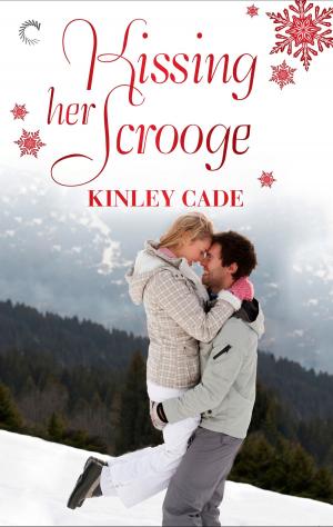 Cover of the book Kissing Her Scrooge by Julie Rowe