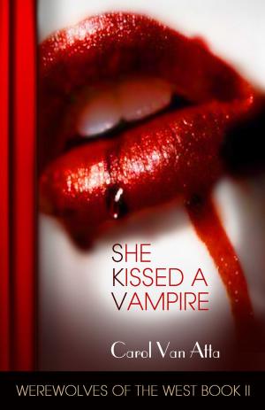 Cover of the book She Kissed a Vampire by Carol Van Atta