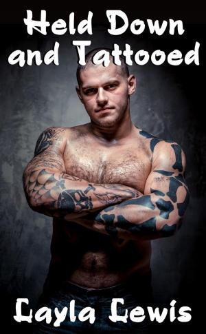 Cover of the book Held Down and Tattooed (a BDSM male dominant erotica) by Lily Cox