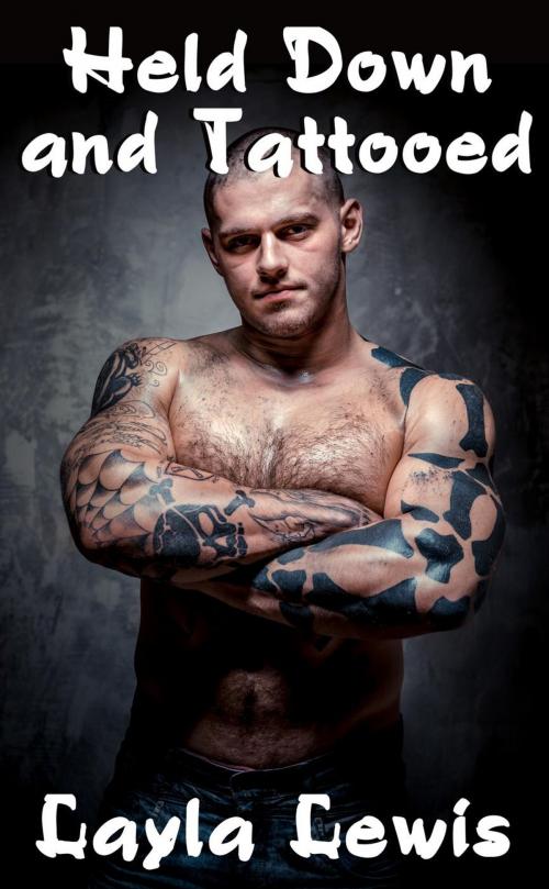 Cover of the book Held Down and Tattooed (a BDSM male dominant erotica) by Layla Lewis, Elio Lewis