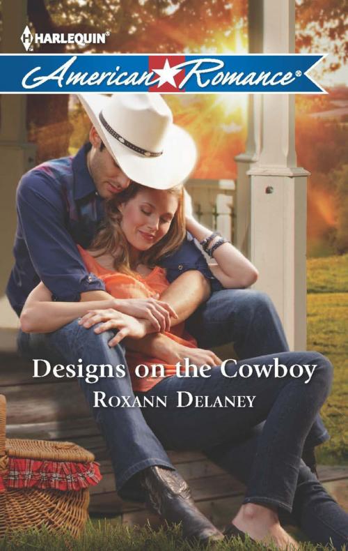 Cover of the book Designs on the Cowboy by Roxann Delaney, Harlequin