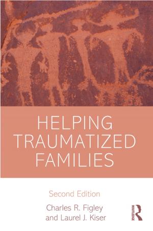 Cover of the book Helping Traumatized Families by Ian Hunter, Jane Saunders